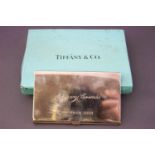 A Tiffany & Co plain rectangular form silver card case with flip top lid, 6cm x 9 cm,