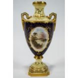 A Coalport two handled porcelain urn,