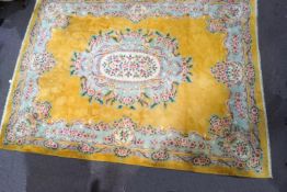 A large Chinese full pile wool rug,
