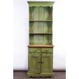 A narrow painted pine dresser, the base with twin drawers above twin panelled doors,