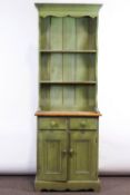 A narrow painted pine dresser, the base with twin drawers above twin panelled doors,