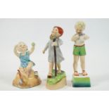 A group of three Royal Worcester ceramic days of the week figures,