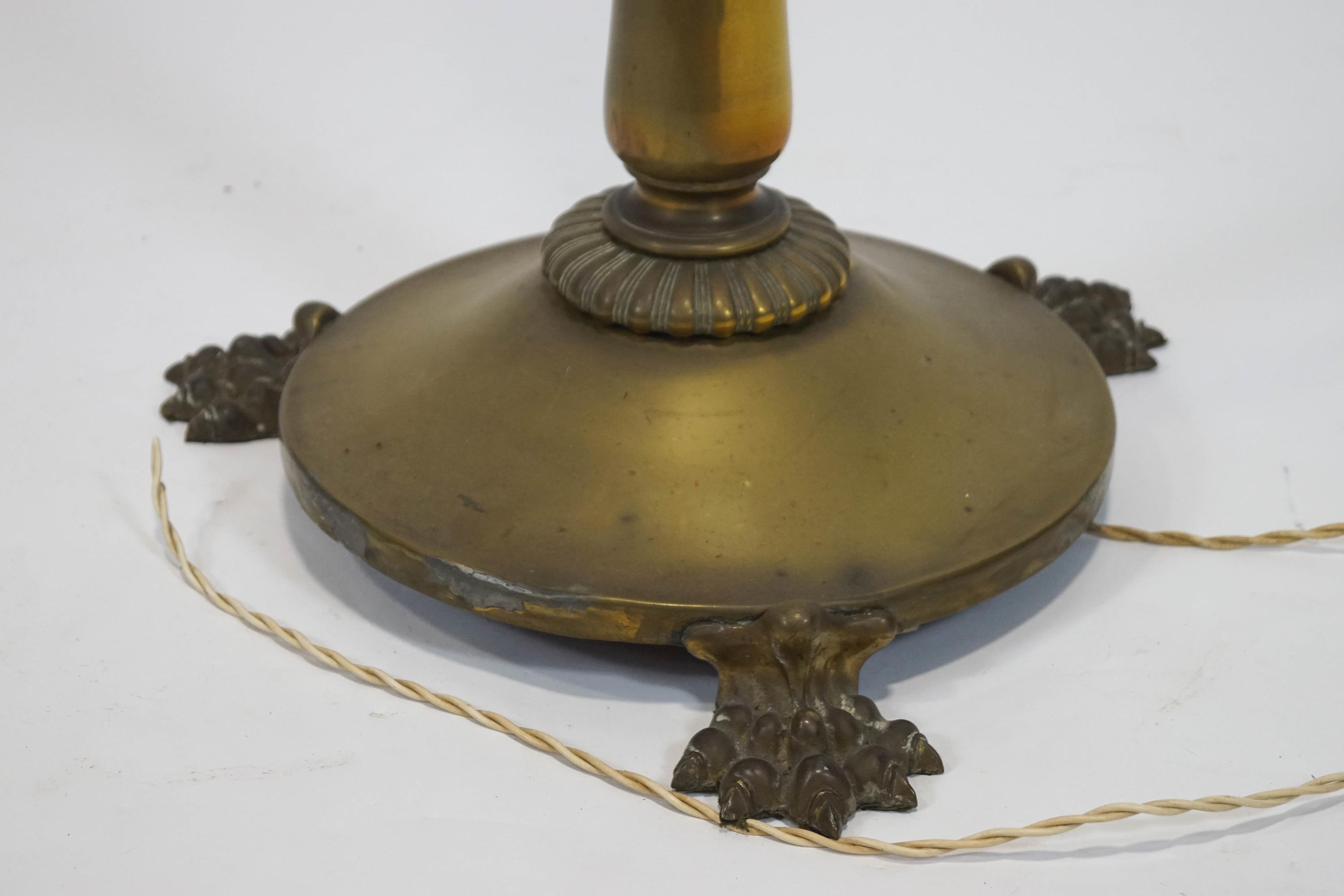 A brass telescopic standard lamp, on round base with three paw feet, - Image 2 of 2