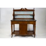 A late Victorian inlaid mahogany marble topped wash stand,