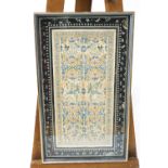 A framed Chinese silk embroidery, decorated with phoenix and butterflies in foliates,