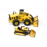 A Tonka toy Mighty Loader,