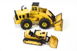 A Tonka toy Mighty Loader,