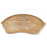 A Robert 'mouseman' Thomson of Kilburn shaped oval oak tray with raised edge and mouse handles,