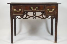 A George III oak lowboy,