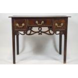 A George III oak lowboy,