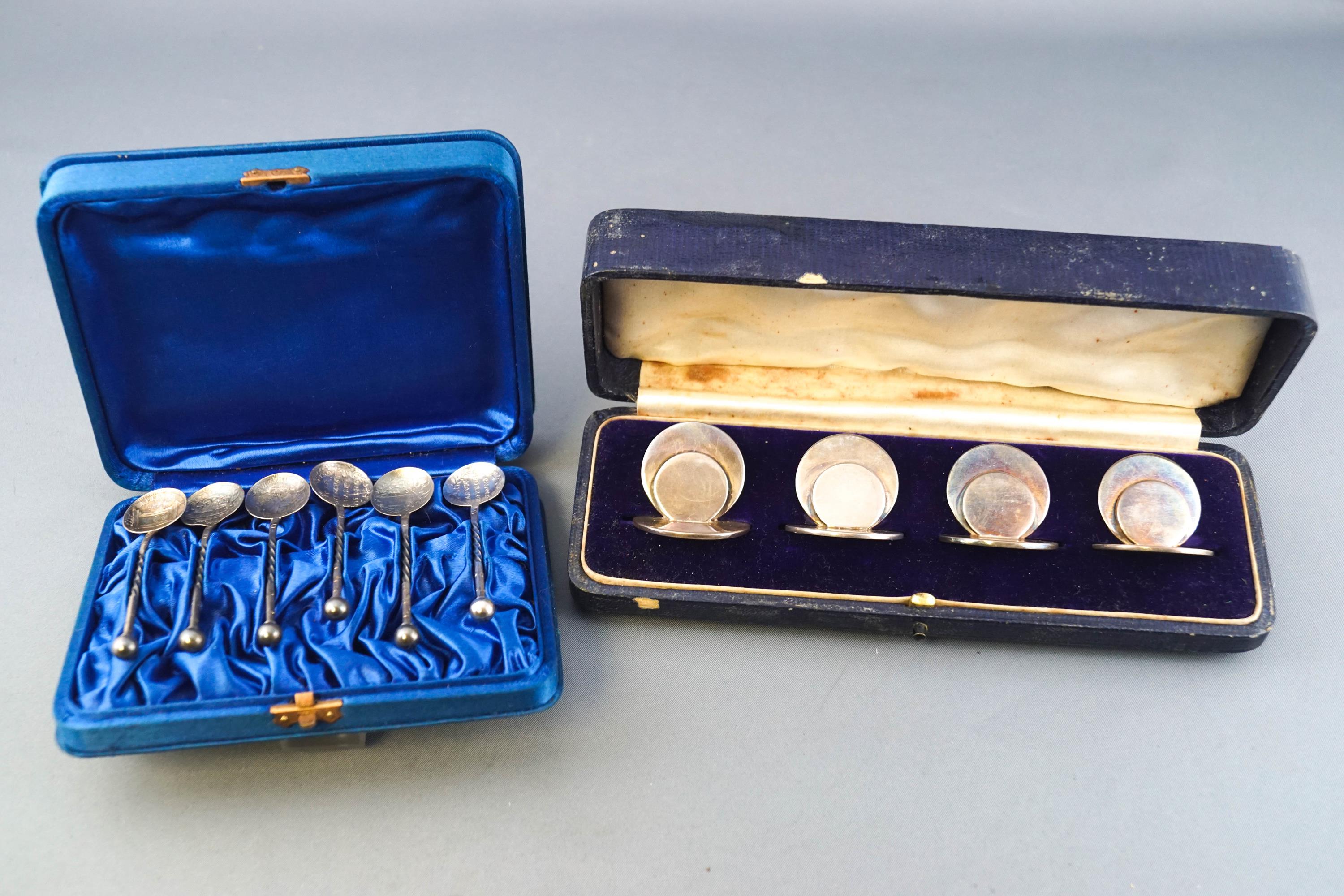 A cased set of four silver plain round form menu holders, Samson Mordan & Co, Chester 1907,