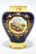 A Coalport porcelain baluster vase,