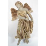 An early 20th century moulded and polychrome painted figure of an Angel,