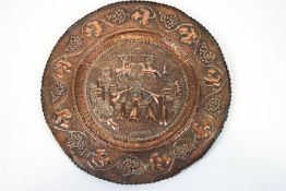 A round copper tray embossed with the Peace Bridge in Bosnia-Herzogovenia,