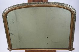 A Victorian over-mantel mirror, of arched form,