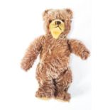 A Steiff Zoty bear, 28cm tall, stud deficent,