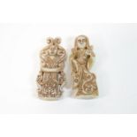 A carved hard stone figure of an Asian dancing lady and another of a man in an elaborate curved