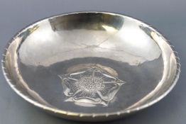 A Keswick Staybrite steel bowl with Tudor Rose centre, signed and marked to the underside,