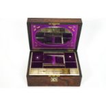 A Victorian walnut and mother of pearl inlaid ladies work box, the interior with mirror inset top,