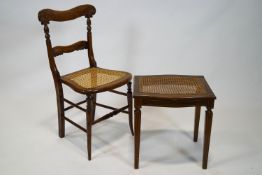 A Regency faux rosewood salon chair with carved shape back rail and splat over a Bergere seat