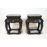 A pair of mid 20th century Chinese incised lacquer stands/low tables of cut cornered square form