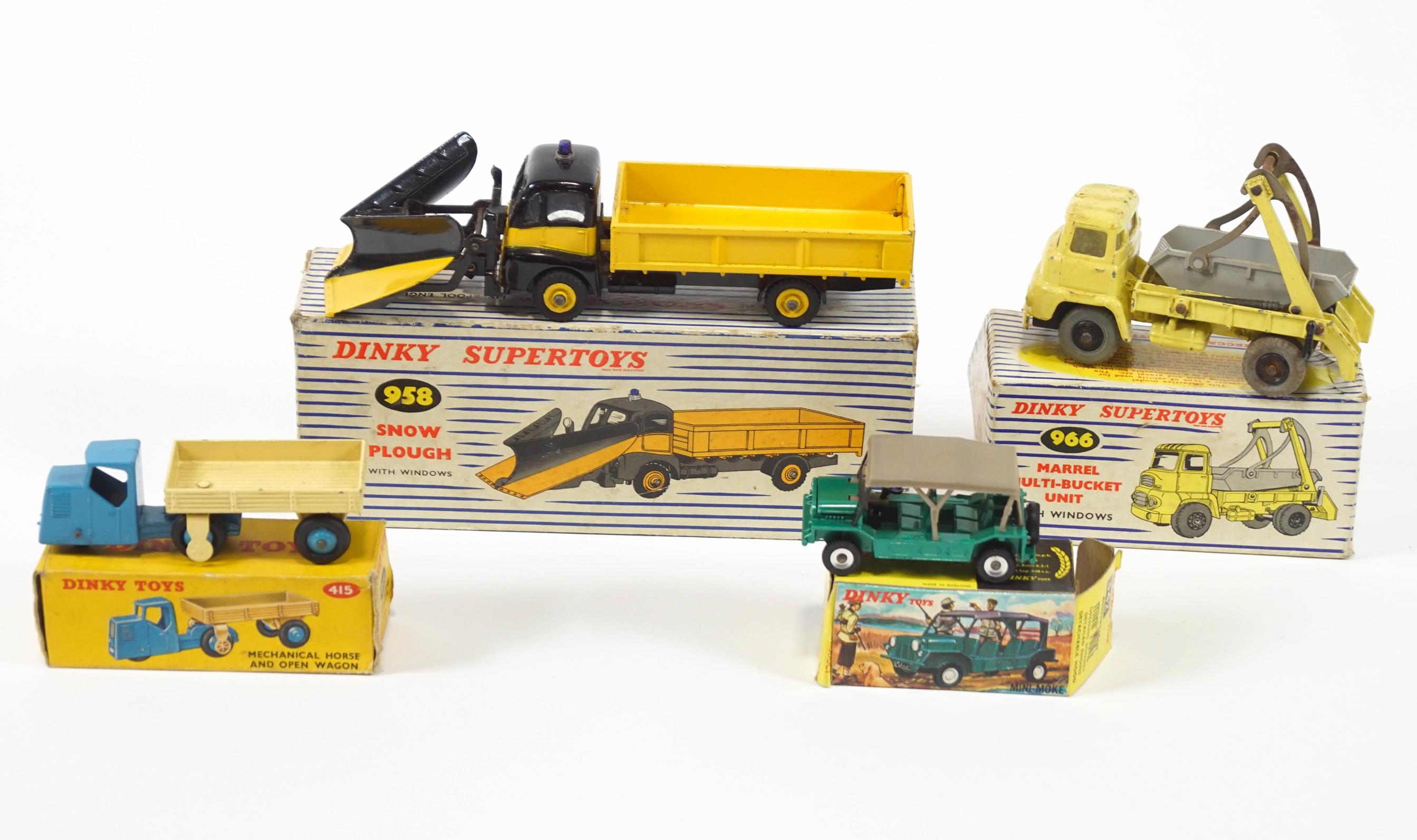 A group of four boxed Dinky Die casts,