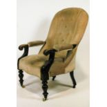 A 19th century mahogany armchair with padded back over scroll arms,