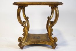 A two tier gilt wood table,