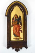 A 19th century Italian gilt gesso wood panel, depicting an Angel playing a lute,