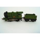 An early Hornby electric train set, boxed, with engine, tender and two Pullman carriages,