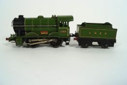 An early Hornby electric train set, boxed, with engine, tender and two Pullman carriages,