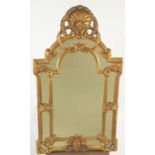 An 18th century style gilt framed wall mirror,