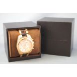 A rose metal Michael Kors Bradshaw wristwatch having a linked rose metal bracelet.