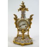 A Franklin Mint 'Antoinette' clock, the porcelain case with French style gilt metal mounts,