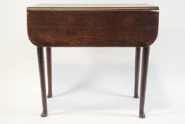 An 18th century oak Pembroke table, fitted end drawer,