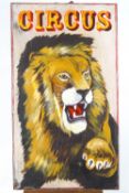 A Circus advertising sign, painted on wood with a lion,