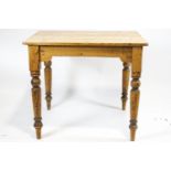 A 19th century pine kitchen table,
