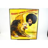A Circus advertising sign for 'Hindu Animal Hypnotist', painted on wooden planks,