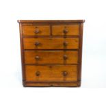 A mid 19th century mahogany chest of two short and three long graduated drawers,