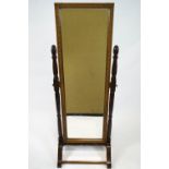 A mahogany and oak cheval mirror,