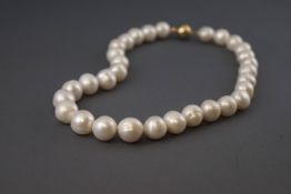 A single strand of white cultured freshwater pearls.