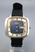 A Bulova Accutron wristwatch. Silver/Blue dial with baton markings and day/date feature.