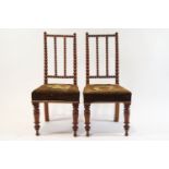 A pair of Victorian bobbin turned side chairs, with bobbin turned backs,