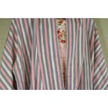 A pink and grey striped Kimono with pink flower decorated 0be,