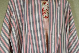 A pink and grey striped Kimono with pink flower decorated 0be,