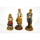 Three Victorian continental majolica style figures, each with impressed pattern numbers,