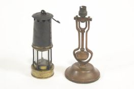 A 19th century miners lamp, numbered 604, 24cm high, together with and a ships desk light,