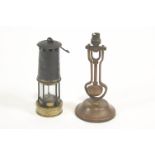 A 19th century miners lamp, numbered 604, 24cm high, together with and a ships desk light,