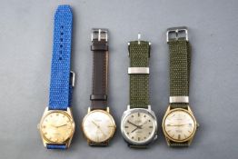 A collection of seven dress watches all fitted with leather or fabric straps.