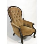 A Victorian mahogany show wood frame armchair with button back on cabriole legs,